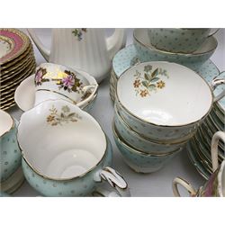 Paragon tea wares decorated with floral sprays within pale blue borders, to include teacups and saucers, together with further pink and gilt tea wares of waved form etc