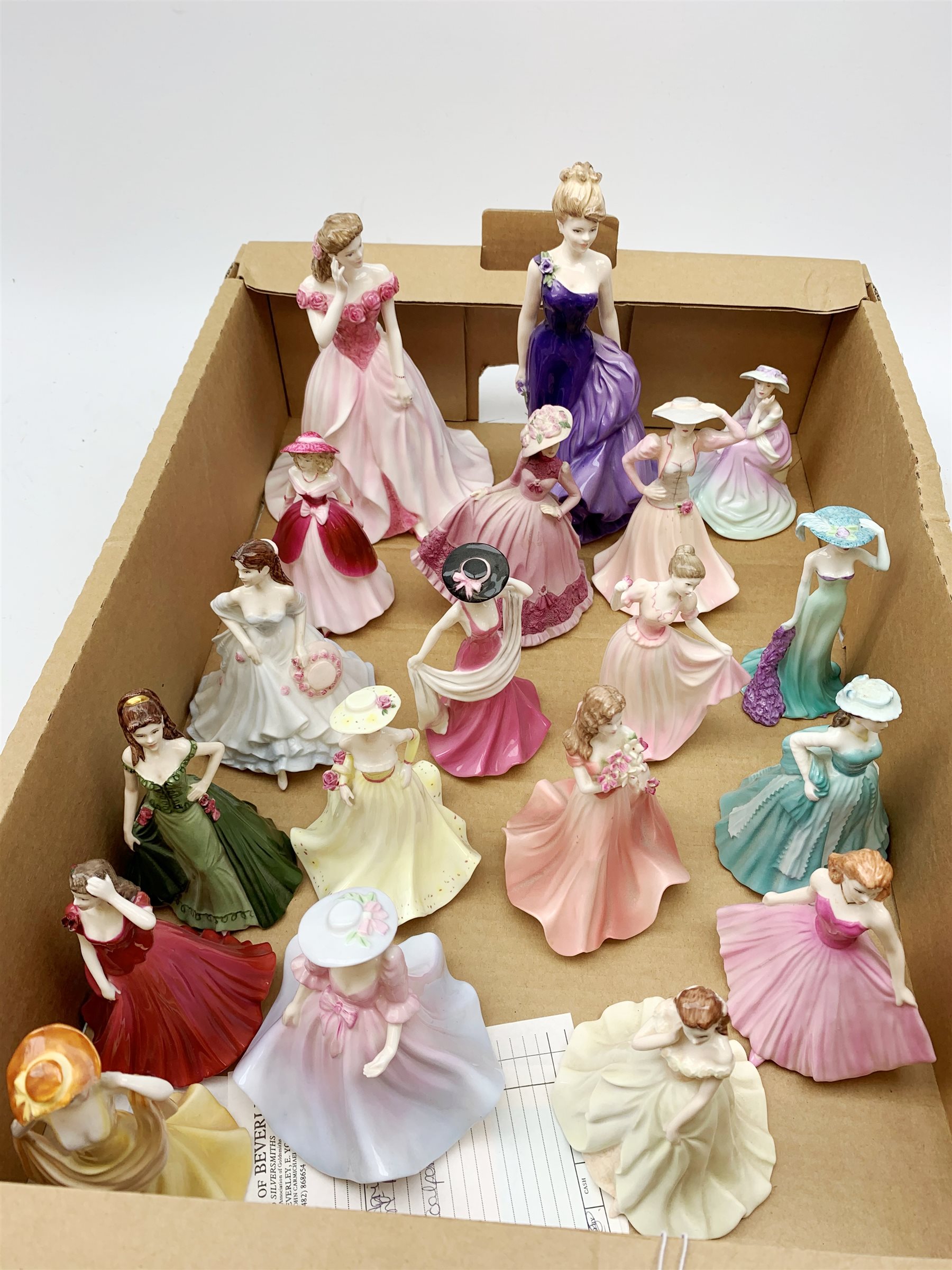 A group of nineteen Coalport figurines, comprising Ladies of Fashion Anastasia, Figurine of the year Sarah, Kerry, Poppy, Celebration Time, The Garden Party, and Fascination, modelled by John Bromley, Heart to Heart Missing you, Debutante of the year 1997 Poppy Ball, Valentine Debutante Endless Love, and Endless Love, Debutant Lauren , Debutante Summer Boquet, Debutante Shelley, Anita, and Your Special Day, modelled by Jack Glyn, Debutante Kirsty modelled by Andy Moss, April 1993, and Beau Monde Jill modelled by Martin Evans. (19). 