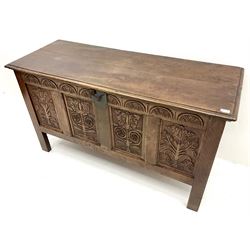 Early 19th century carved oak blanket box, single hinged lid, four carved panel front, stile supports 