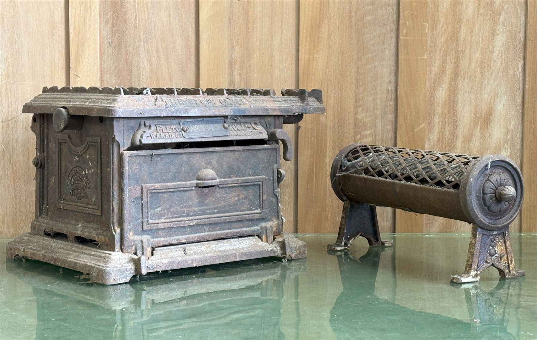 Victorian cast iron tabletop cooker, 'The Elgin Grill' (H48cm, W33cm, D25cm) together with a cast and shaped metal heating element (L38cm) (2) - COLLECTION BY APPOINTMENT FROM: The White House, Thirsk Road, Easingwold, York, YO61 3NF - CALL 01723 507111 TO ARRANGE