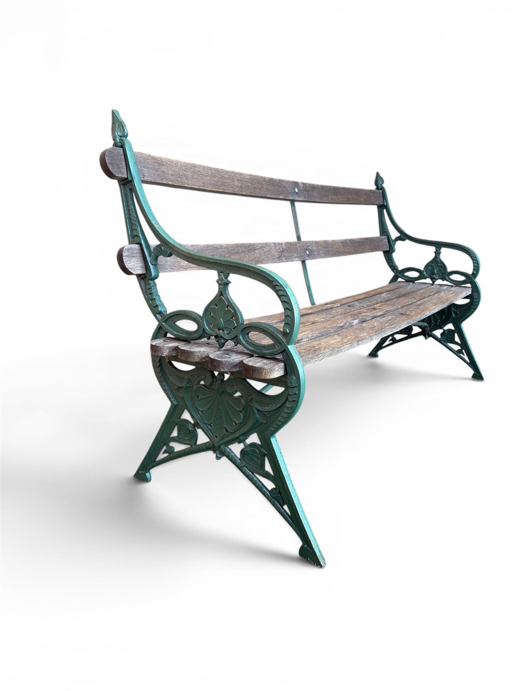 Coalbrookdale - Lily Pad design cast iron an wood slatted garden bench, late 19th century Aesthetic Movement, no. 217569, painted in green with iron centre support and seat stretcher, hardwood slatted