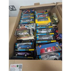 Collection of 1:43 scale diecast model vehicles, mostly Bburago, all boxed, in three boxes