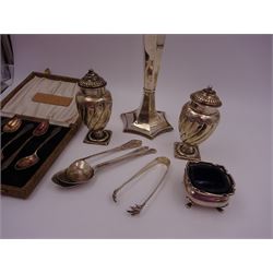 Group of silver, comprising trumpet vase, pair of pepper shakers, open salt, cased set of six silver spoons and other silver cutlery, including continental examples