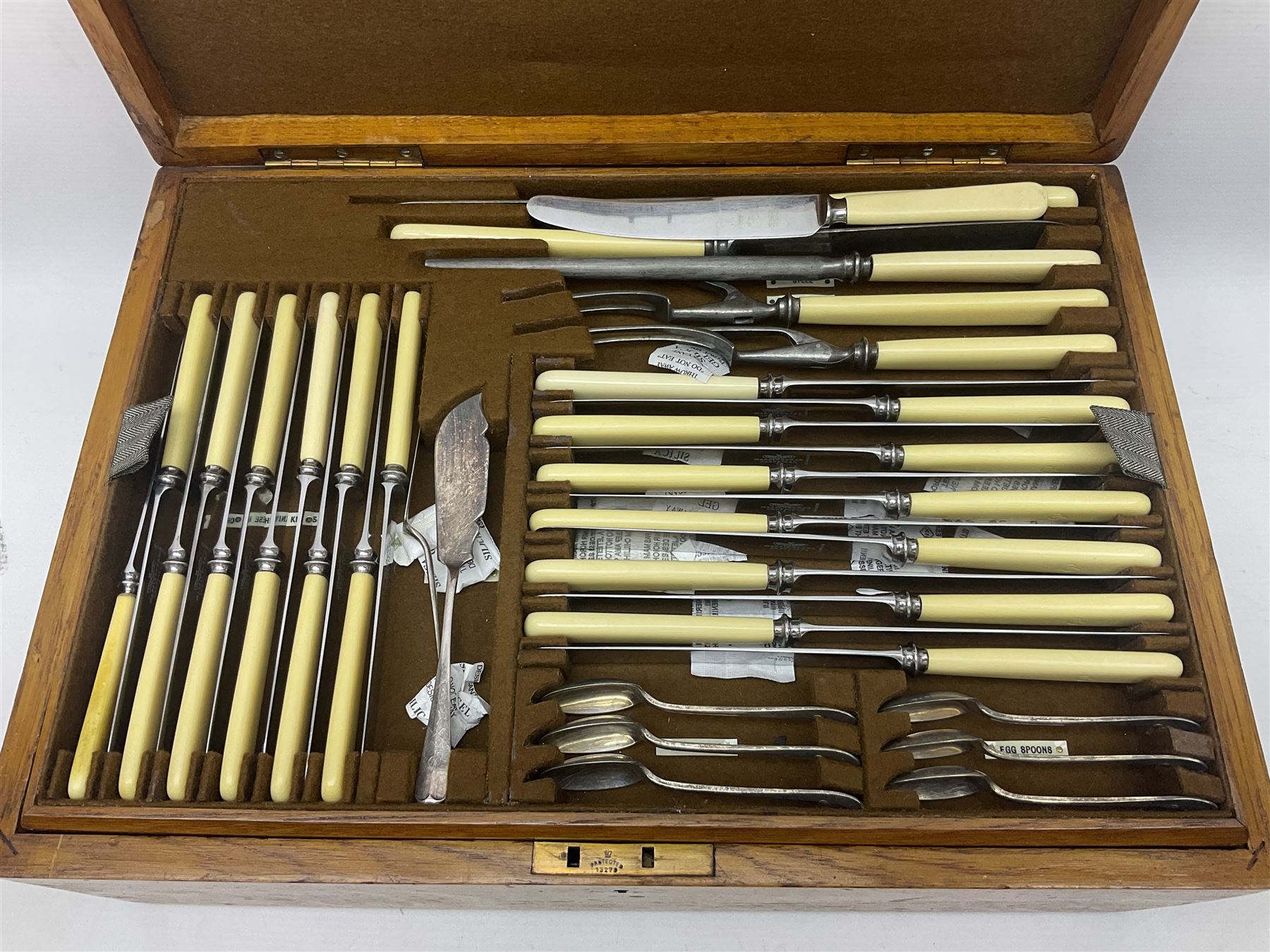 Mappin & Webb silver plated canteen of cutlery, the oak case with hinged lid two two removable trays, and sunken brass handles, H19cm, L52cm