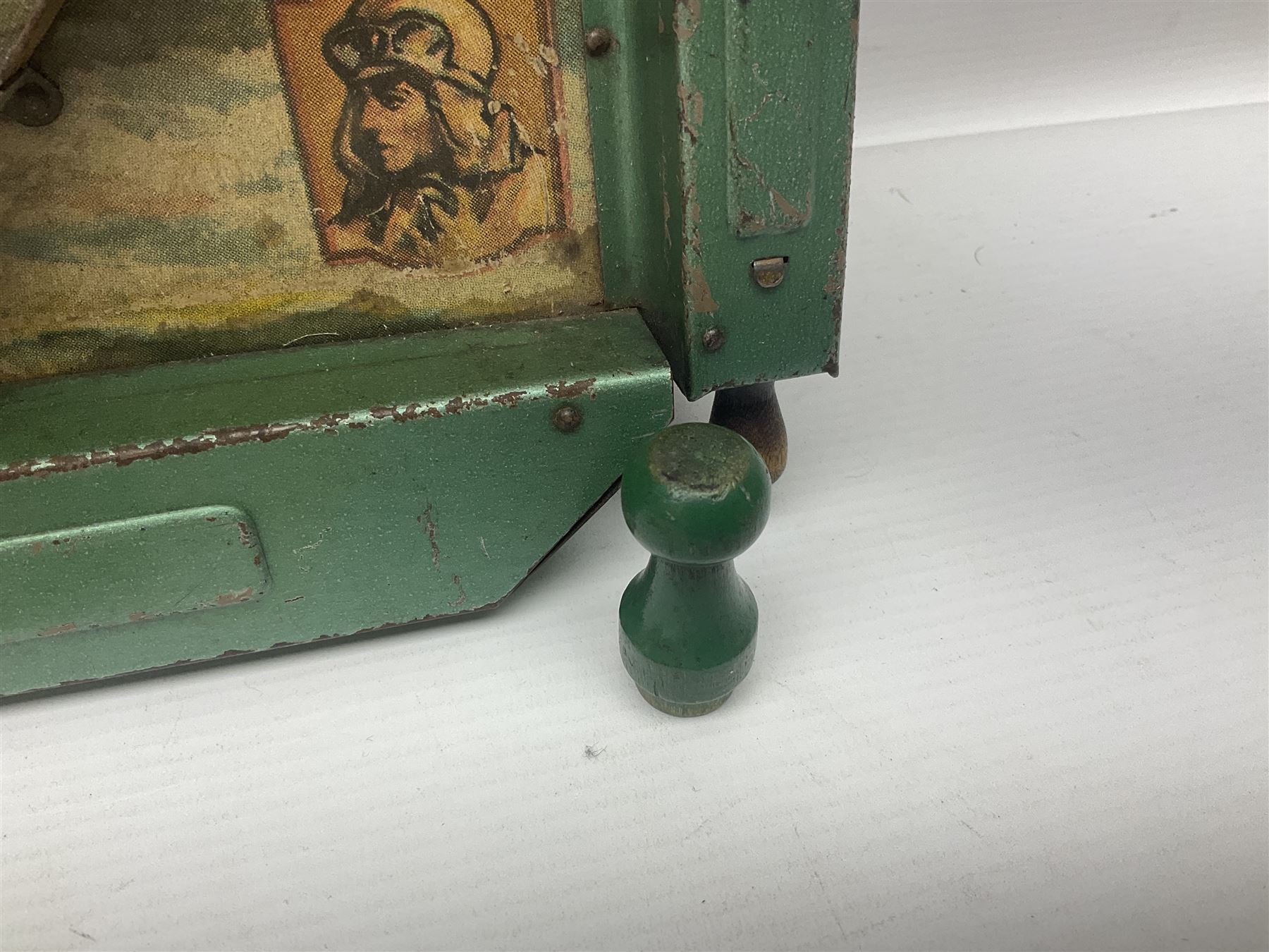 1934 Lindstrom's 'Airways' tin-plate bagatelle game by Lindstrom Tool and Toy Company Bridgeport Conn., the decorative bagatelle board depicting Lindstrom's epic airway routes; with wooden peg and quantity of balls H61cm