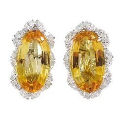 Pair of 18ct white gold large oval citrine and marquise shaped diamond cluster clip on earrings, each citrine approx 27mm x 10mm x depth of approx 5mm