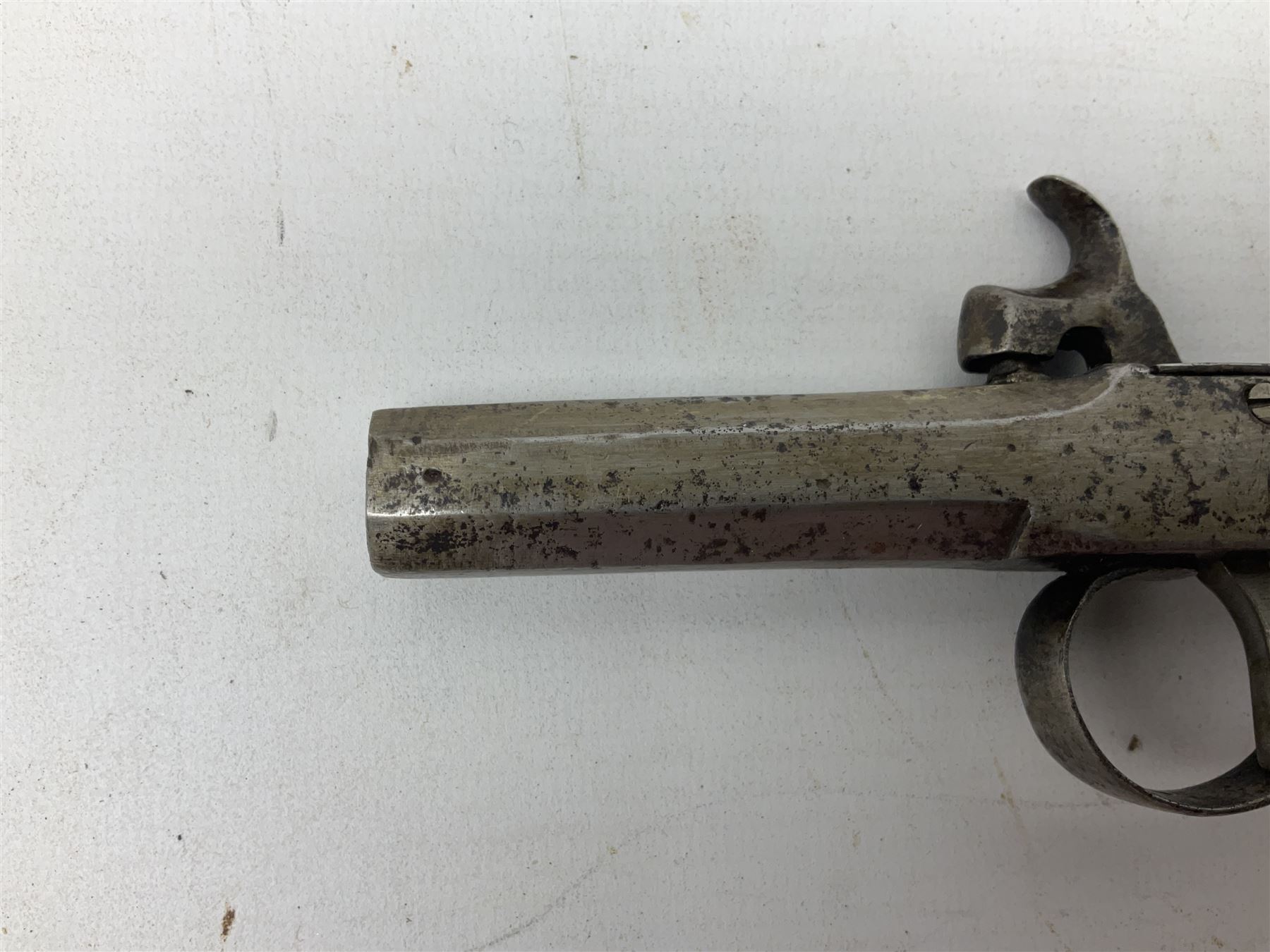 Mid 19th century double barrel percussion muff pistol, joined 7cm octagonal barrels with walnut stock19cm overall; a matching single barrel muff pistol 17cm overall (2)
