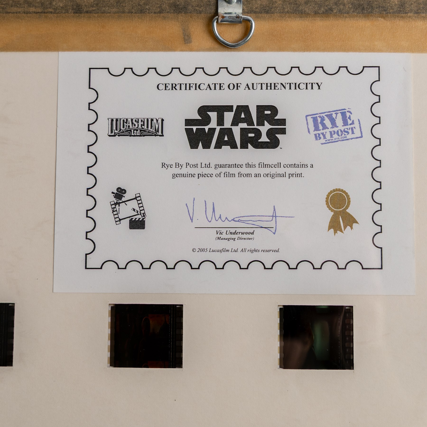 Four Cards Inc Star Wars The Movie Poster Collection prints, comprising Episode I Attack of the Clones, A New Hope, Return of the Jedi and The Empire Strikes Back, all framed, H37cm, together with a Rye by Post The History of Star Wars Original Filmcell collection, with certificate of authenticity verso
