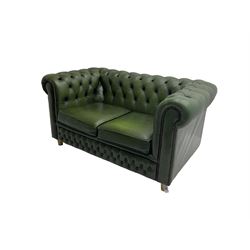 Chesterfield style two seat sofa upholstered in buttoned green leather with stud work