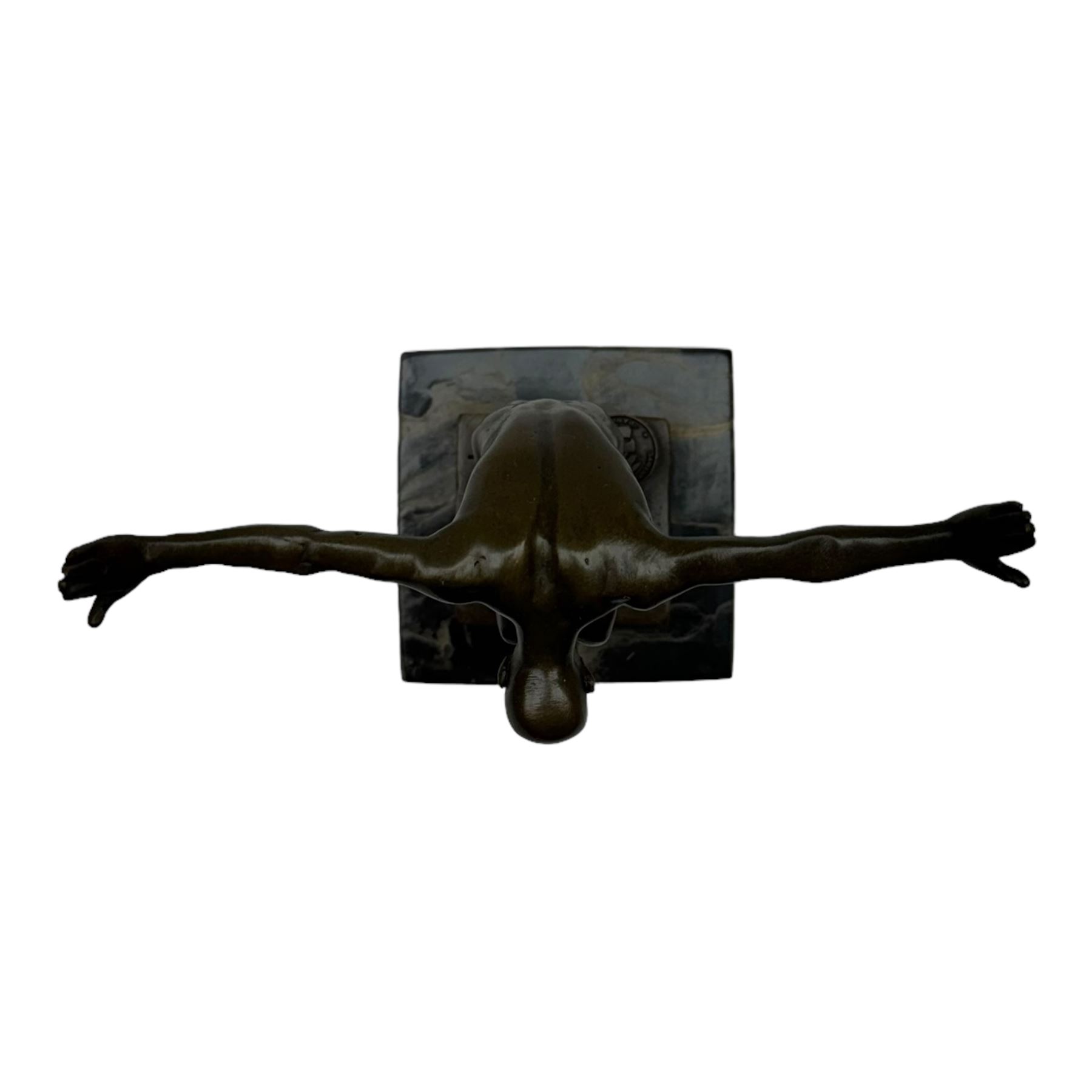 Bronze figure after Milo, Power Of Silence, modelled as a male athlete crouched with arms outstretched, signed Milo with foundry mark, upon a marble plinth, H15cm