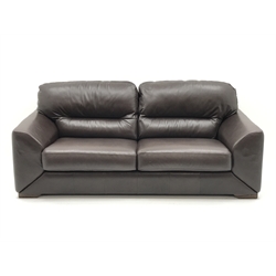 Three seat sofa upholstered in brown leather (W210cm) a pair matching armchairs (W110cm) and footstool (W85cm, H41cm, D85cm) (4)