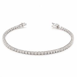 18ct white gold diamond line bracelet, set with seventy-six round brilliant cut diamonds, stamped, total diamond weight approx 2.30 carat