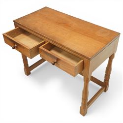 Mouseman - oak side table, rectangular adzed top, fitted with two drawers with turned wooden knobs, raised on octagonal supports, with carved mouse  signature, by the workshop of Robert Thompson of Kilburn
