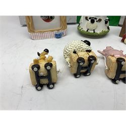 Border Fine Arts Shaun The Sheep Tractor Train and musical figure, together with a Wallace and Gromit photograph frame and a Gromit cruet sett, three in original boxes  