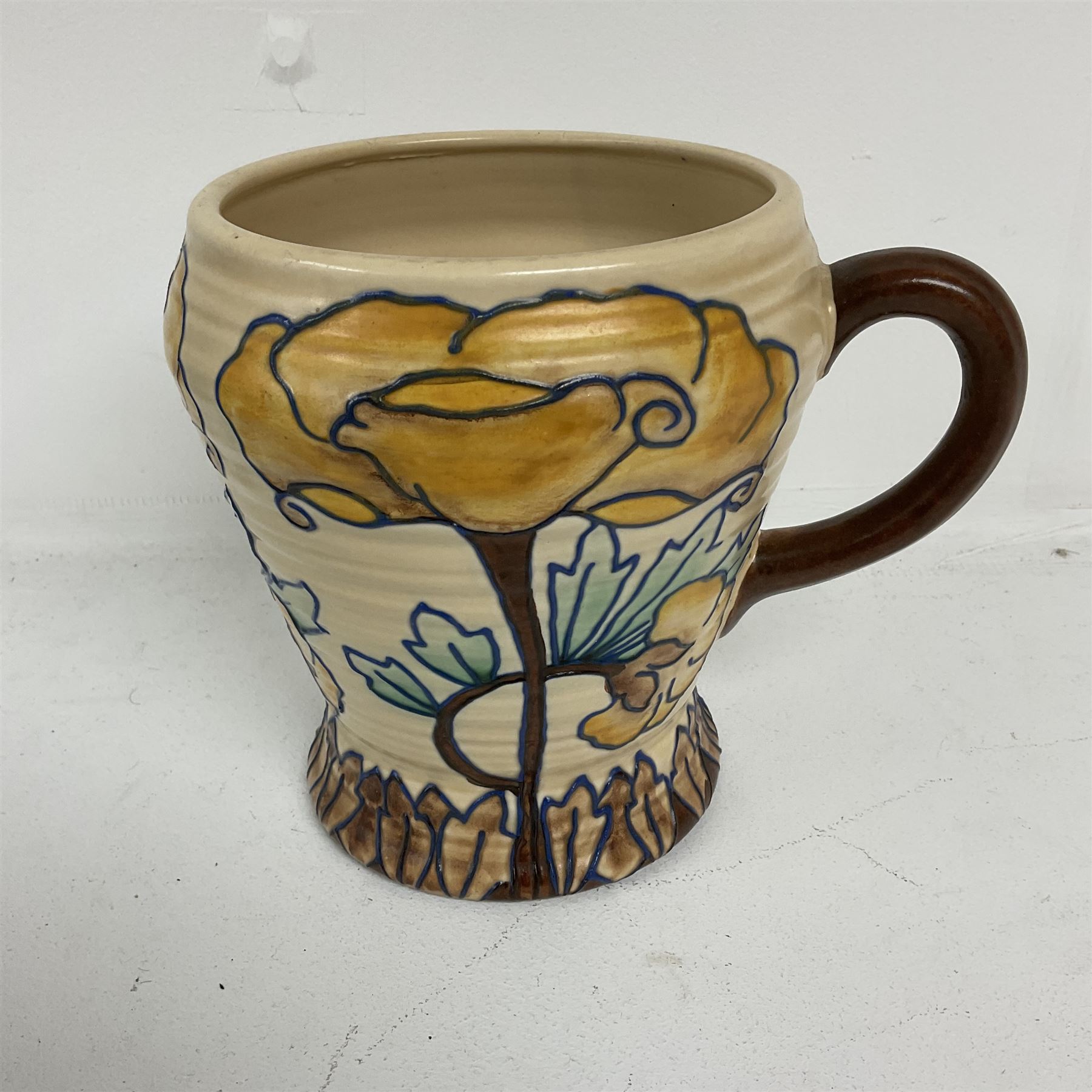 Royal Cauldon single handled vase of tapering form tube lined with a floral pattern by Edith Gater H17cm