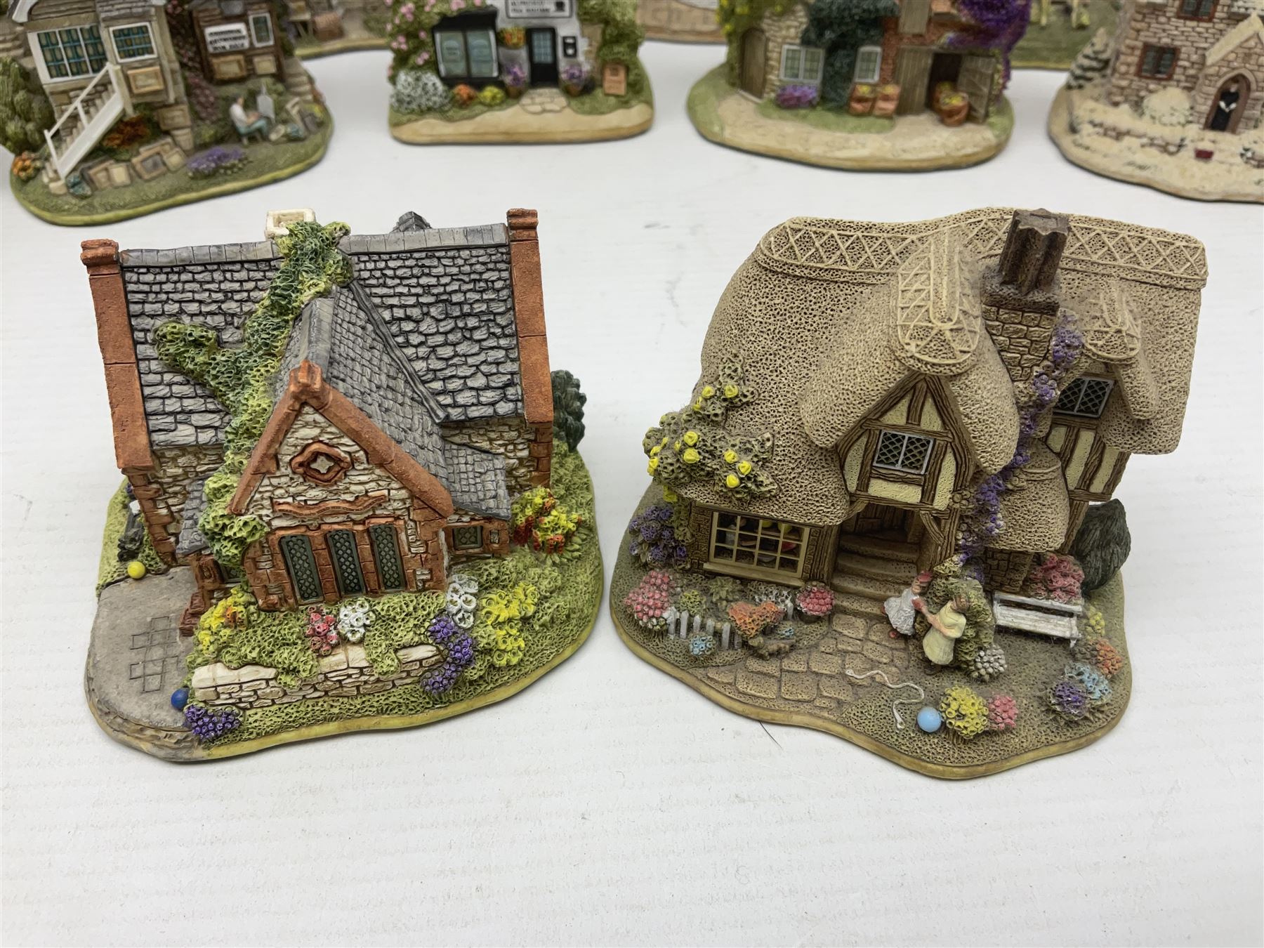 Twenty Lilliput Lanes, including The Right Note, Chatterbox Corner, Whistle Stop Gate, New Neighbours, Travellers Rest etc, all in original boxes