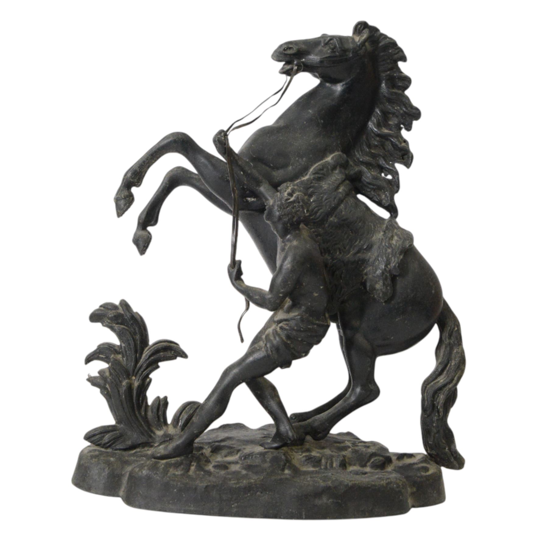 Three spelter Marley Horse figures, after Guillaume Coustou, each modelled as a rearing horse restrained by  groom, tallest H41cm