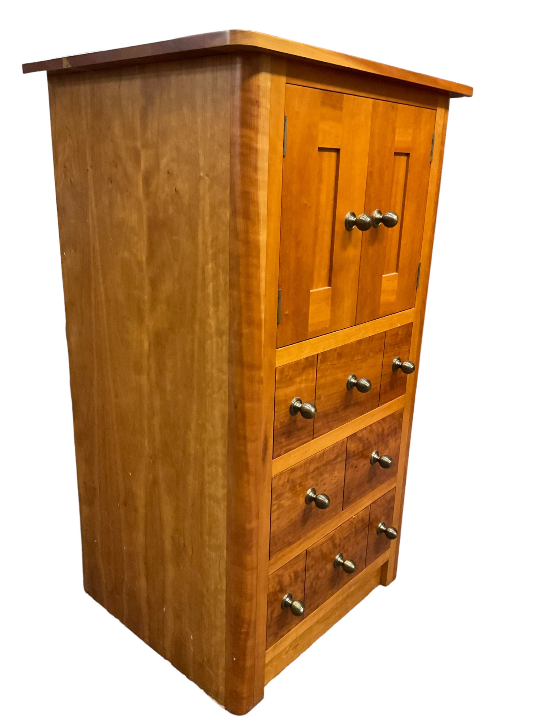 Cherry wood cabinet, fitted with double cupboard over two short and two long drawers, with faux drawer facias
