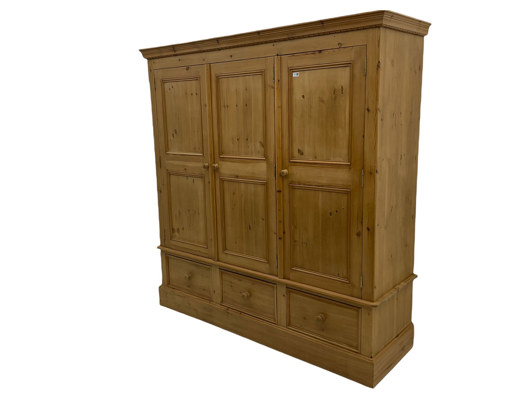 Solid pine triple wardrobe with three drawers