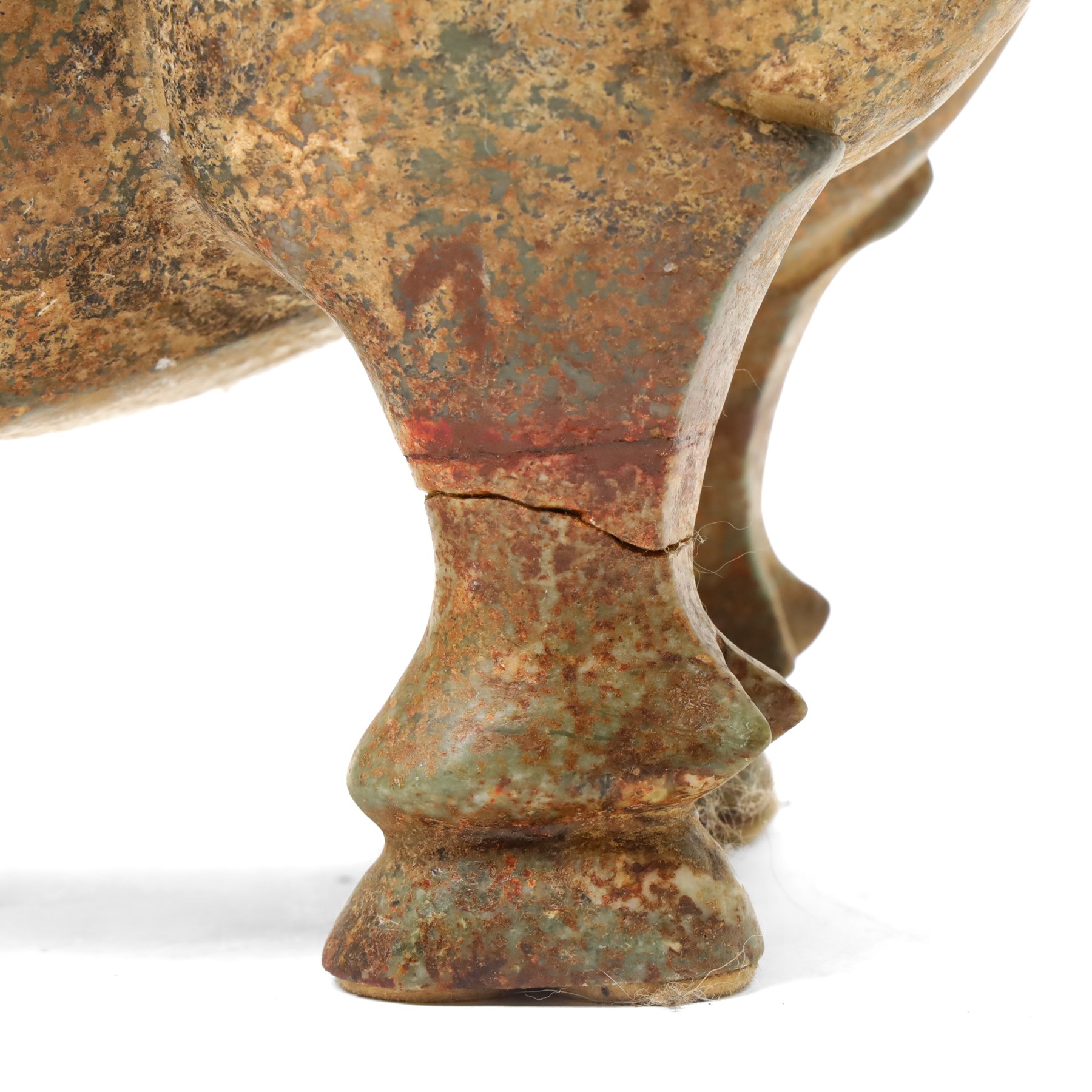 Carved stone Rhino, W44cm and a pair of two green stone Elephants, W38cm (3)