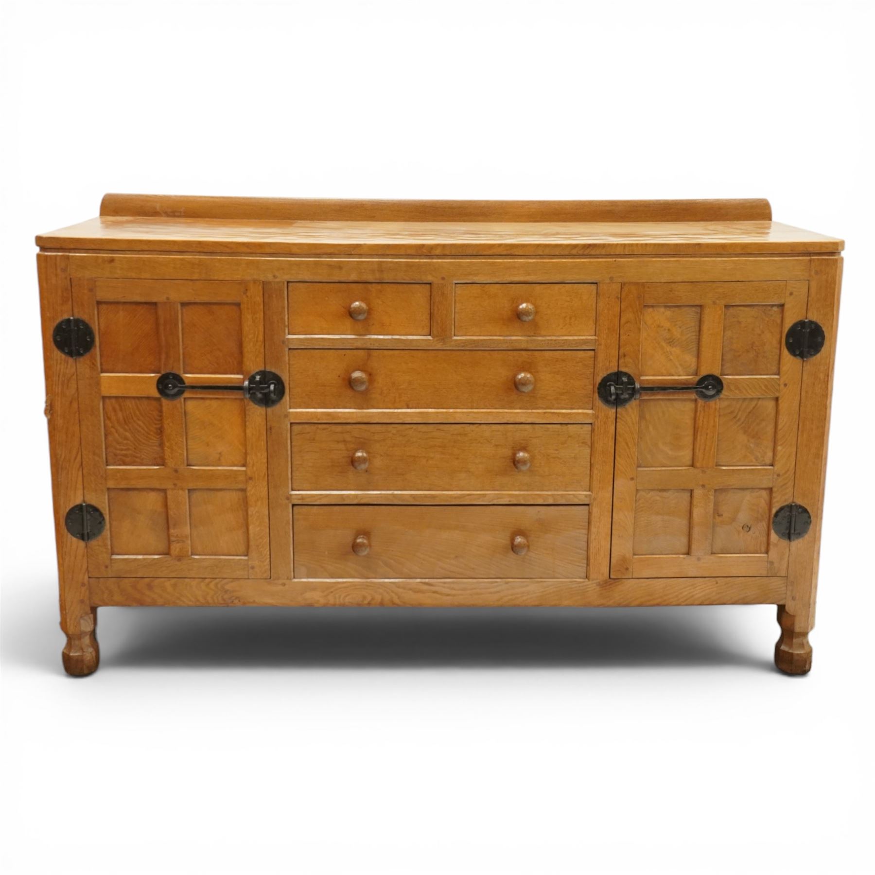 Mouseman - adzed oak dresser, rectangular top with galleried back, fitted with six drawers and two cupboards, blackened metal latches and circular hinges, with carved mouse signature, by the workshop of Robert Thompson of Kilburn