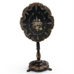 Victorian papier mache table, tilt top with painted decoration and mother of pearl inlay, raised on a baluster column shaped base terminating in pad feet