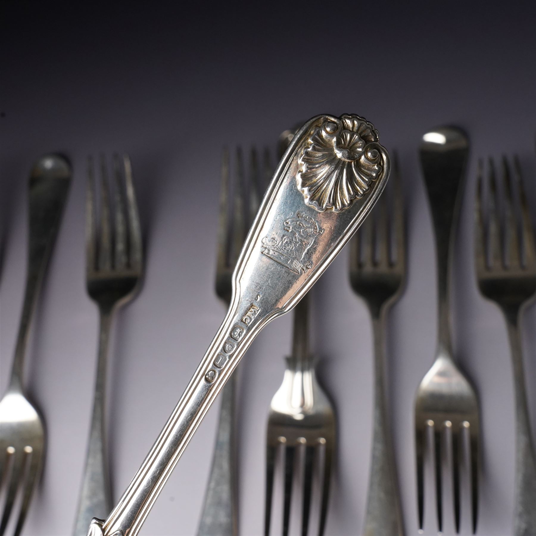 Pair of George IV silver fiddle, thread and shell pattern table forks Lonson 1826 and ten other 19th century silver table forks, various dates and makers (12)