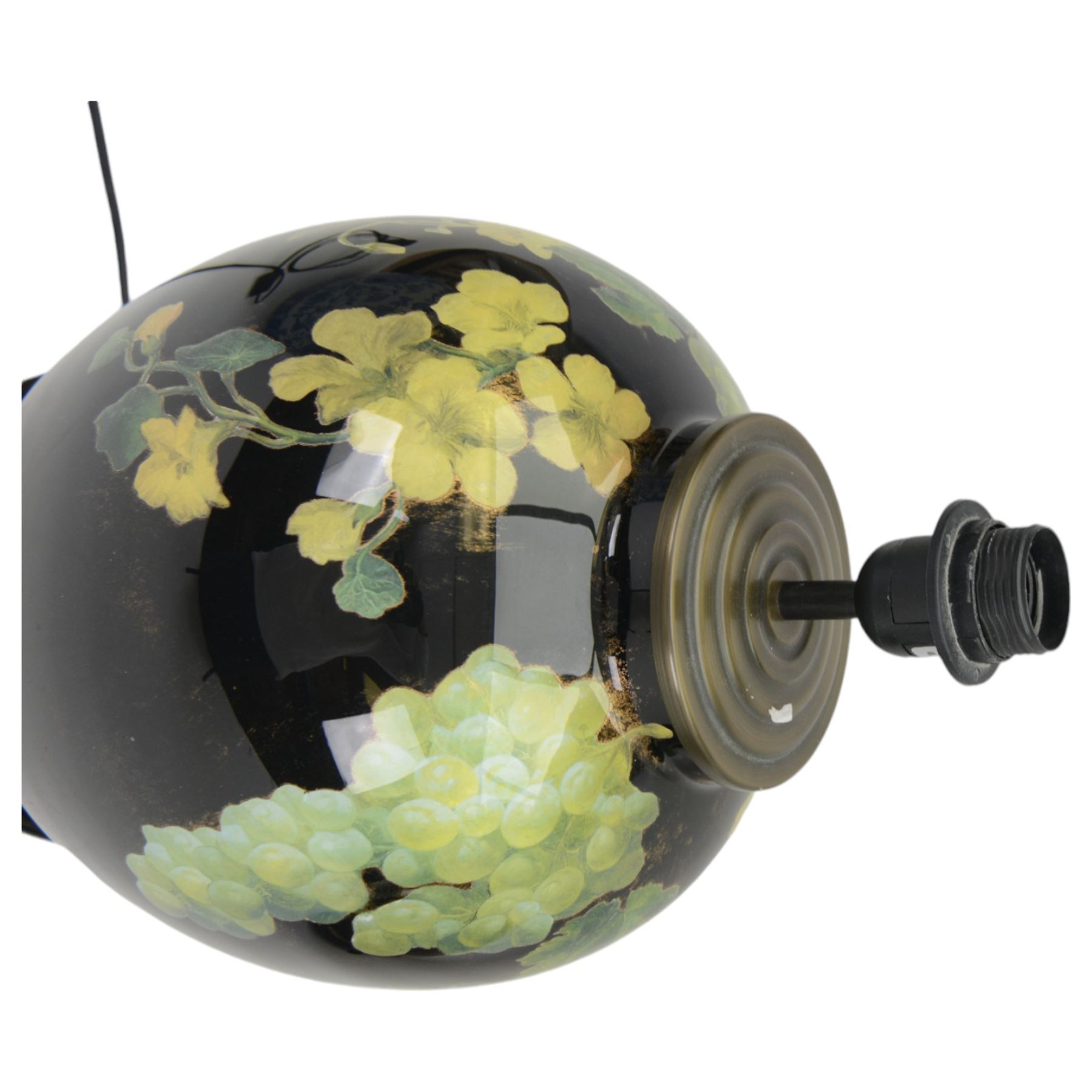 Pair of Jenny Worrall table lamps, of ovoid form, the glass body decorated with fruit and trailing flowers upon a black ground with gilt flecks, with pleated cream lampshades, including shades H65cm