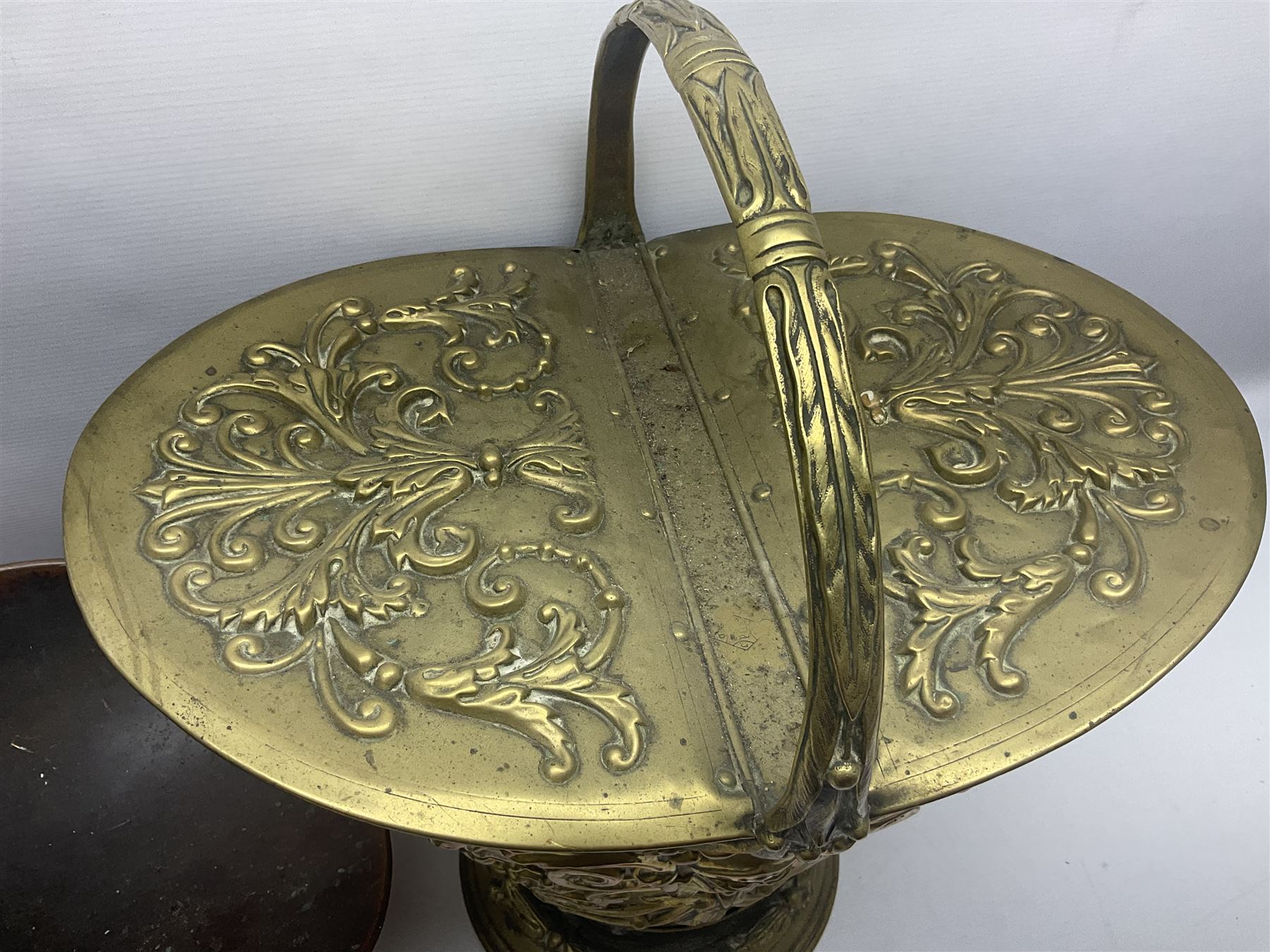 Victorian Benham & Froud Arts and Crafts brass coal scuttle, with Victorian diamond registration mark, together with a copper and brass scuttle of helmet form, tallest H50cm