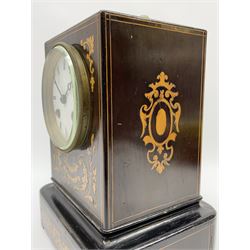 Late 19th century French ebony and satinwood inlaid Pendule D'officer campaign carriage clock, rectangular case with circular white enamel Roman dial, twin train eight day movement striking the hours and half on bell, inlaid throughout with scrolled and trailing foliage, gilt brass carrying handle and glass panel 