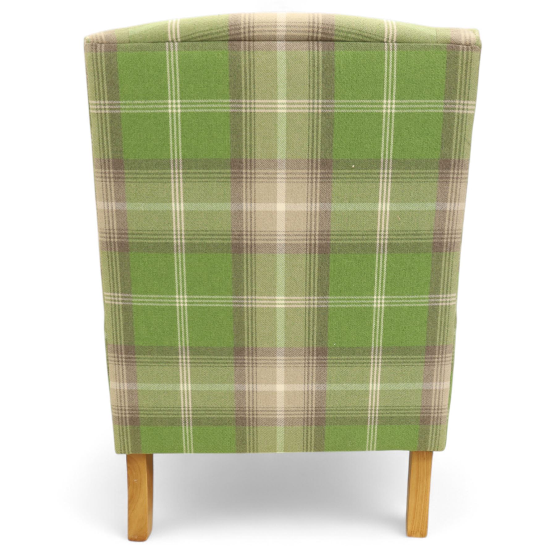 Contemporary green tartan upholstered wingback armchair, with scroll arms and loose seat cushion, raised on turned beech front supports with brass castors