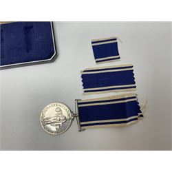 Collection of WW2 and police medals c.1933-1955, awarded to Eric Drinkwater comprising 1939-45 War Medal, Defence Medal, 1939-45 Star and Burma Star, on wearing bar; 1918-62 General Service Medal with Cyprus clasp to P.S. E.G. Drinkwater; boxed; Police Long Service and Good Conduct Medal to Const. Eric C. Drinkwater; cased; Royal Life Saving Society bronze medal to E.C. Drinkwater July 1933; boxed; and George V 1937 coronation medallion; boxed.