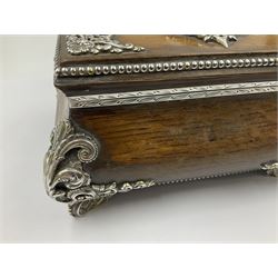 Victorian silver mounted oak casket, of bombe form, with ornate scrolling silver mounts and beaded rim, set with a silver medallion to centre of hinged cover, engraved 