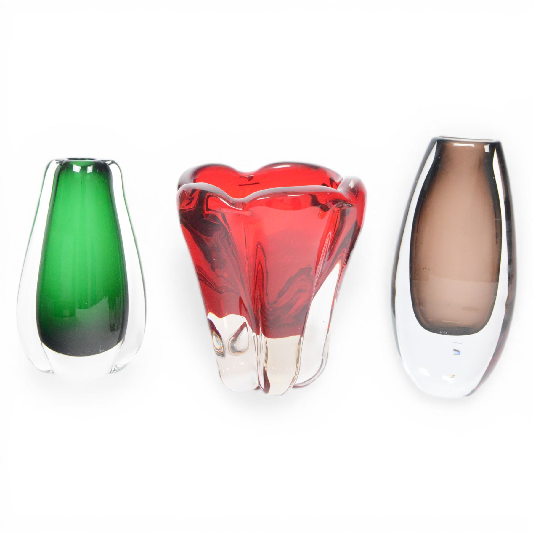 Three mid-century vases, comprising green Czech ‘winged’ vase, cinnamon vase, B894, designed by Gunnar Nyland for Strombergshyattan, signed beneath and Whitefriars ‘molar’ vase, designed by William Wilson 