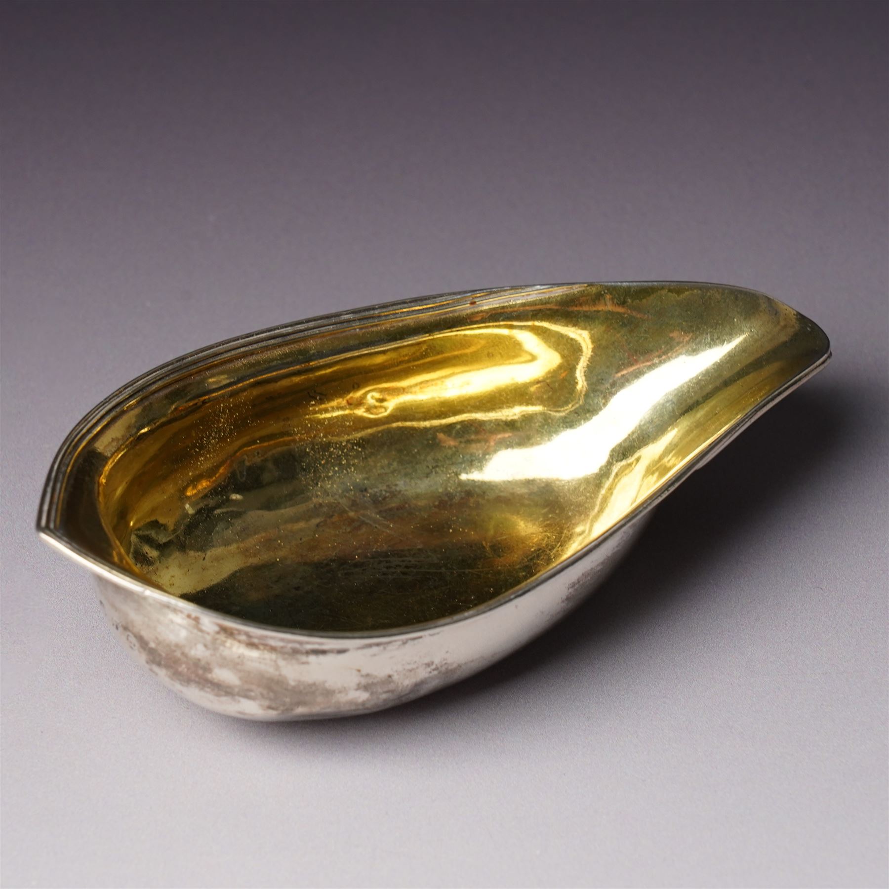 George III silver pap boat with gilded interior London 1799 and a silver gilt copy of the Coronation spoon, cased L25cm London 1936 Maker Wakely & Wheeler