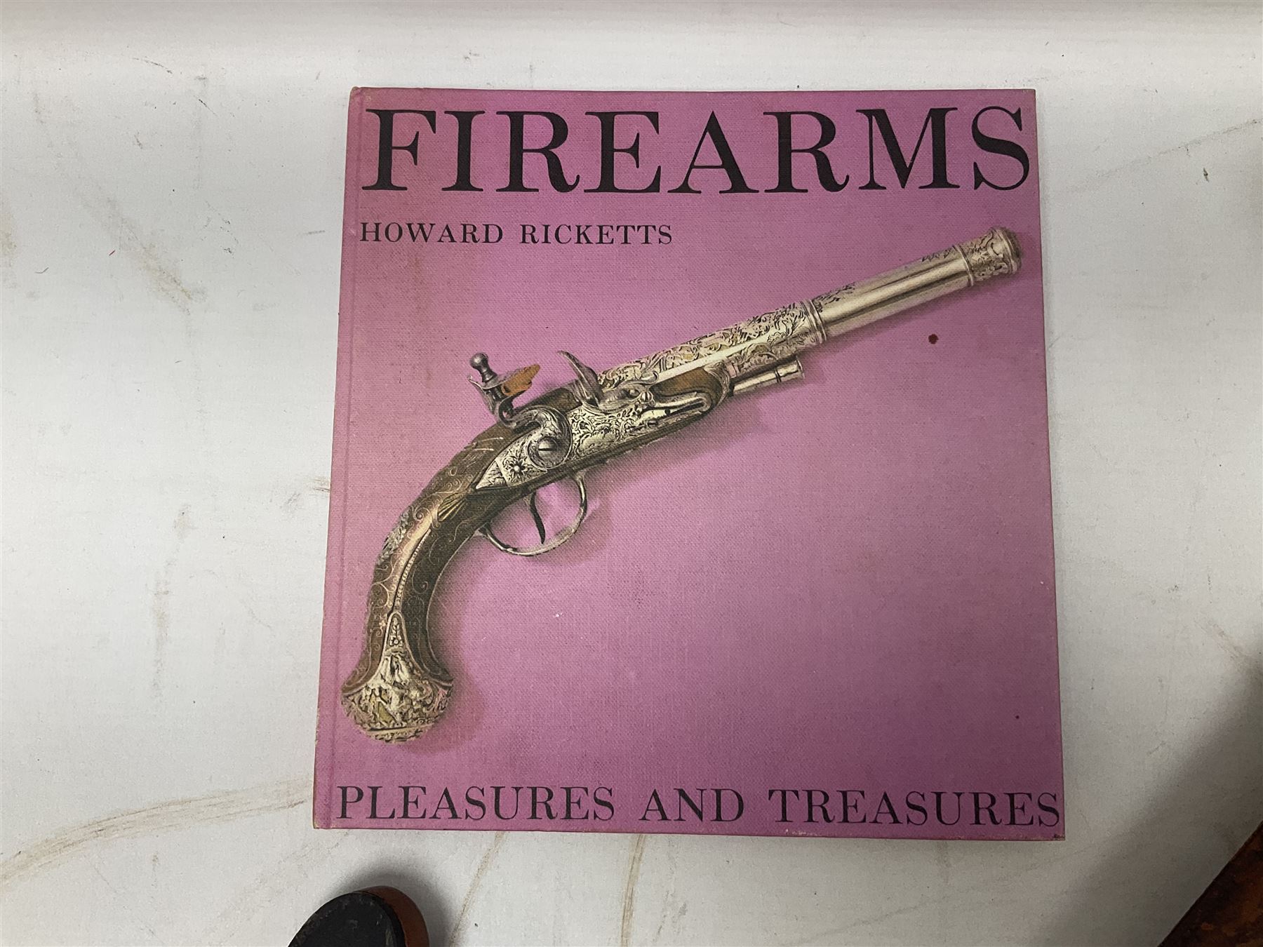 George V 1897 pattern Infantry officers sword, the 82cm single fullered blade with traces of etched detail and George V crown cipher, the ricasso marked Hawksworth Sheffield, pierced half basket hilt with George V cypher, wire-bound fish-skin grip with brass pommel and backstrap; in leather scabbard L102cm overall; together with two sectional gun cleaning rods; swagger stick made of leather strips etc