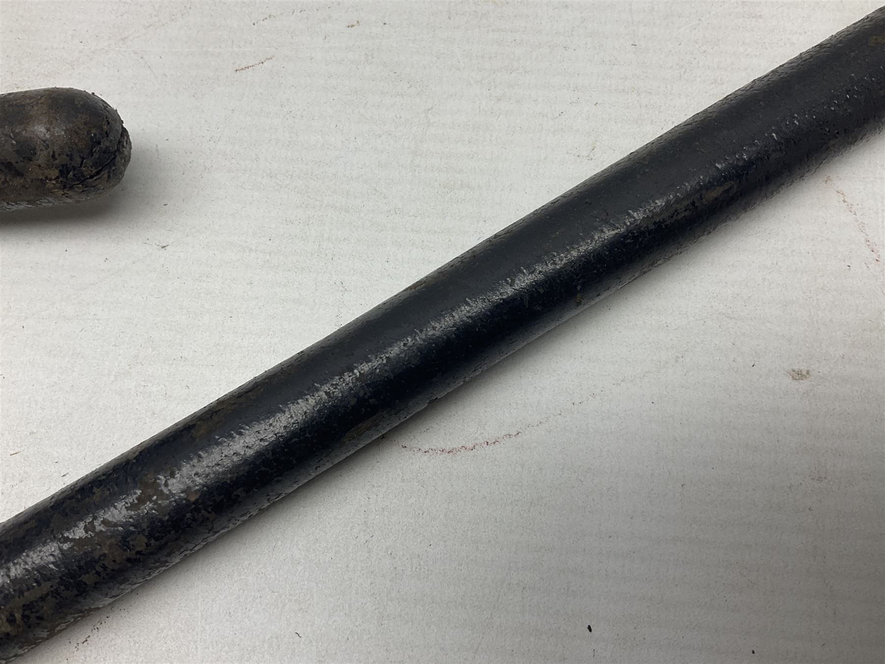 Early 20th century British Army Officer’s leather covered swagger / sword stick by Swaine & Adeney of 185 Piccadilly London; 34.5cm double edged spear point blade with etched foliate decoration and retailer’s details; stamped 'Forged in London' to the edge of the ricasso; L59.5cm overall