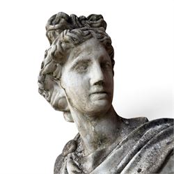 Roman Neoclassical style cast stone bust, weathered finish, raised on textured stone plinth of tapering form