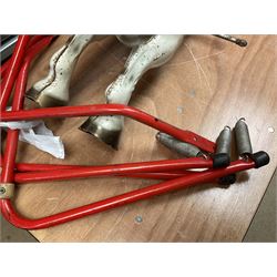 1960's Mobo Toys (David Sebel & Co) Prairie King spring rocking horse on stand, painted pressed steel construction, red tubular stand, trademark red and yellow circular Mobo logo, 100cm long (dismantled)