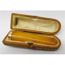 Edwardian amber cheroot holder with gold band, the case stamped Echt Bernstein   