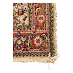 Persian-style wool rug, cream field with floral and geometric motifs, wide floral border (74cm x 142cm); Persian wool rug, beige field with dense floral patterns, narrow floral border (70cm x 144cm); Tribal wool rug, red and navy with diamond motifs (96cm x 60cm); Persian pictorial wool rug, black field with vase, birds, and floral border (70cm x 73cm)