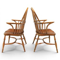 Pair of high back Windsor armchairs, fleur de lis back splat, dished seat, caroline stretcher