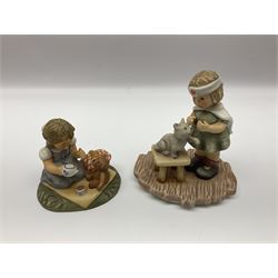 Thirteen Hummel figures by Goebel, to include Sing Along and  Cinderella, together with Goebel cobbled path and Hummelscapes including Into the Park 