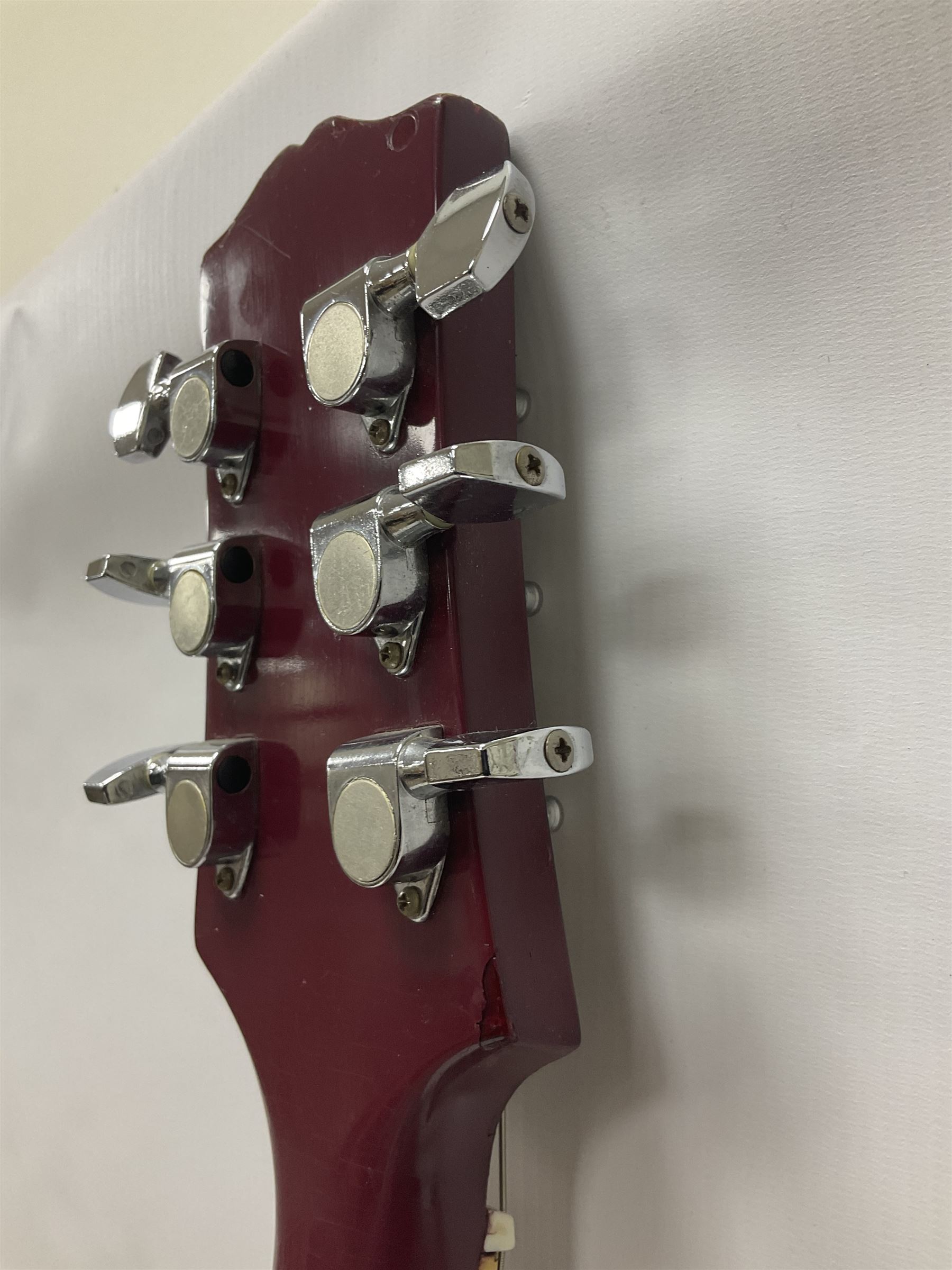 Gibson Epiphone SG six string electric guitar, with cherry red mahogany finish and black scratch guard, L102cm