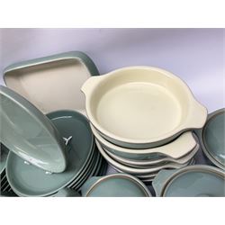 Denby Manor Green pattern part tea and dinner service, to include seven dinner plates, thirteen side plates, ten dessert plates, two oval dishes of various sizes, four cups and saucers, seven bowls with covers, two teapots etc (74)  