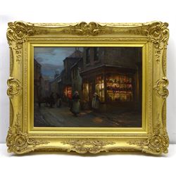 William Pratt (Scottish 1855-1936): 'Evening at Staithes' - the High Street, oil on canvas signed and dated 1909, titled on original label verso 45cm x 60cm 
Notes: Pratt seemingly visited Staithes multiple times in the early 1900s, as the companion to this picture, 'In the Shallows' (sold by Lyon & Turnbull 27/01/16, lot 536), in an identical frame and also depicting Staithes, is dated 1910. The shop in the foreground was a grocery run by Joseph Verrill, described in 1911 as 'grocer and agent for W & A Gilbey Ltd, Wine and Spirit Merchants'. He was often assisted by his two daughters, Lavinia and Hannah. The Verrills were one of the largest families in Staithes; Joseph Verrill Snr (1839-1910) was first coxswain of the Staithes lifeboat, and Isaac Verrill (1811-1895), a fisherman, was photographed by Frank Meadow Sutcliffe (1853-1941). The building became the gift shop of W & H Dean in the 1950s, and is now the Endeavour Café.