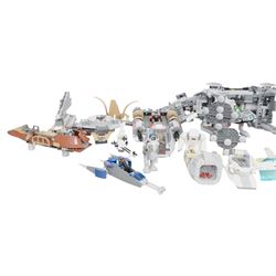 Collection of partially built Lego Star Wars models, including Motorized Walking AT-AT no. 10178, Hyena Droid Bomber no.8016, Emperor Palpatines Shuttle no. 8096, Jabbas Palace no. 4480 and Millennium Falcon no. 4504, etc together with a quantity of Lego Star Wars minifigures, loose parts and instruction booklets for Lego Star Wars sets