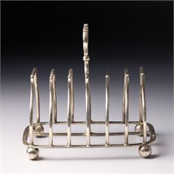 Edwardian silver six division toast rack with loop handle and ball feet Sheffield 1908 Maker Martin Hall & Co