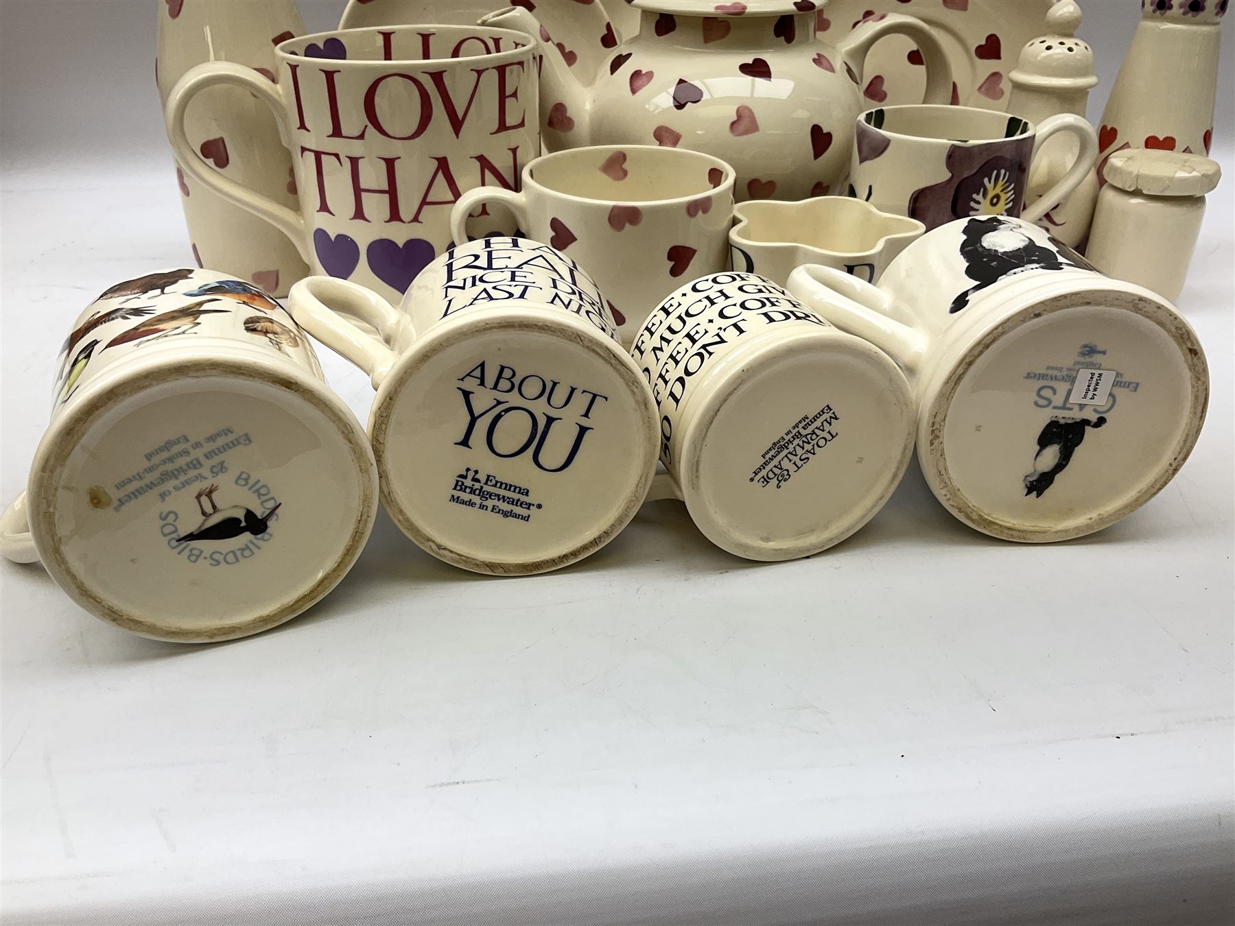 Collection of Emma Bridgewater spongeware ceramics, to include Pink Hearts pattern teapot, milk bottle vase, teacup and saucers, Love & Kisses sugar shaker and large 'I love you more than Marlon Brando' mug, British Birds and Black and White pattern mugs, etc, all with printed marks beneath, tallest H21.5cm