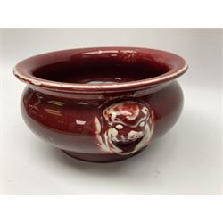 Qing Chinese Sang De Boeuf incense burner, Qing Dynasty, of bombe form with applied lion-mask handles, H11cm